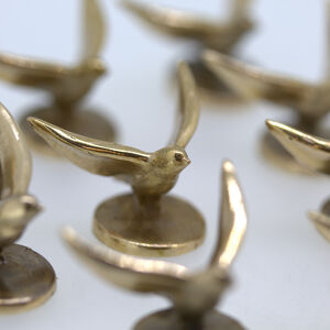Miniatuur "Flying Birdie" brons